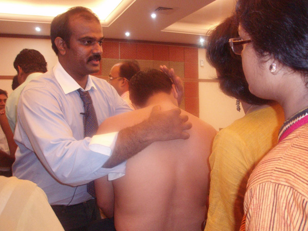 Prof.K.Pearlson explaining Muscle Energy Techniques at kolkatta